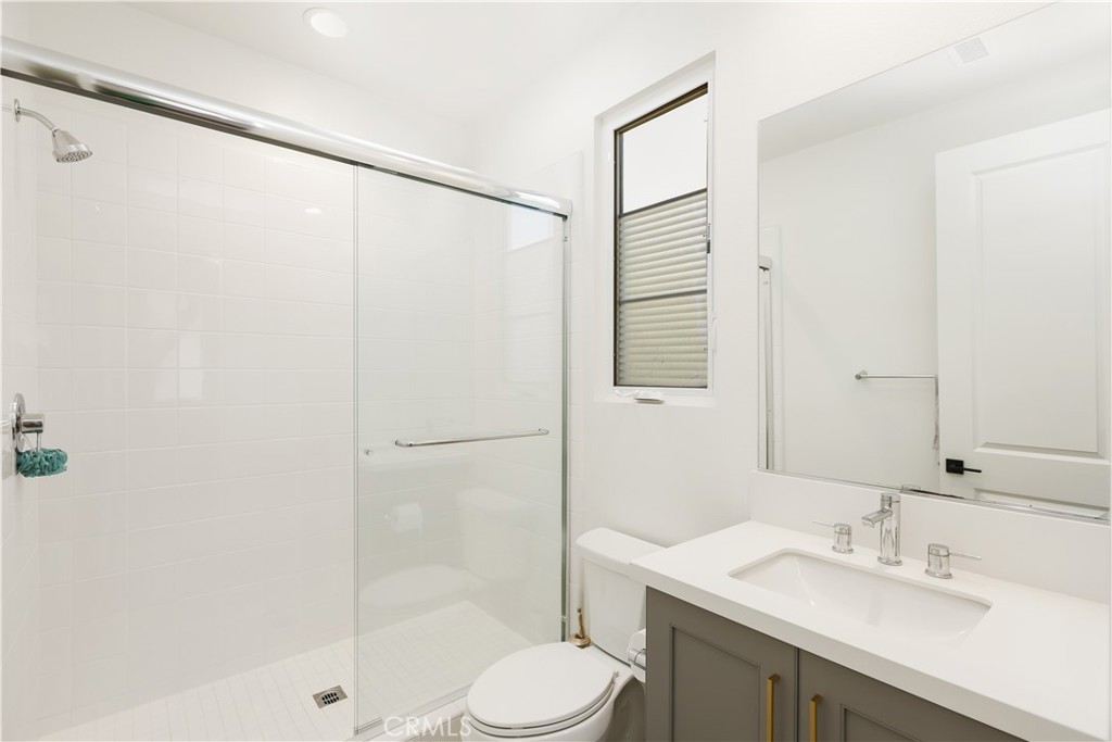 108 Salt Spring Irvine, CA 92602 - Photo 47 of 75 a bathroom with a sink toilet and shower