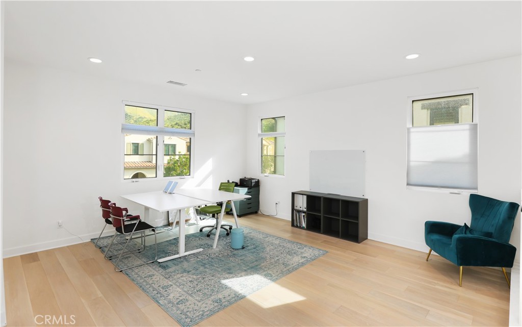 108 Salt Spring Irvine, CA 92602 - Photo 49 of 75 a living room with furniture and a fireplace