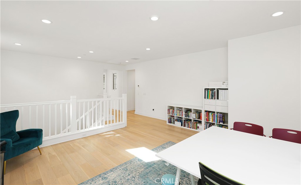 108 Salt Spring Irvine, CA 92602 - Photo 51 of 75 a living room with a baby crib furniture and a dining table