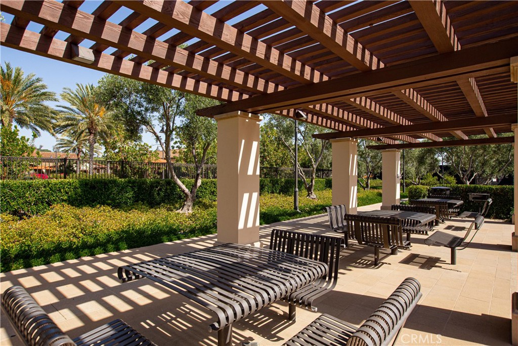 108 Salt Spring Irvine, CA 92602 - Photo 70 of 75 a view of a patio with a table chairs and a patio