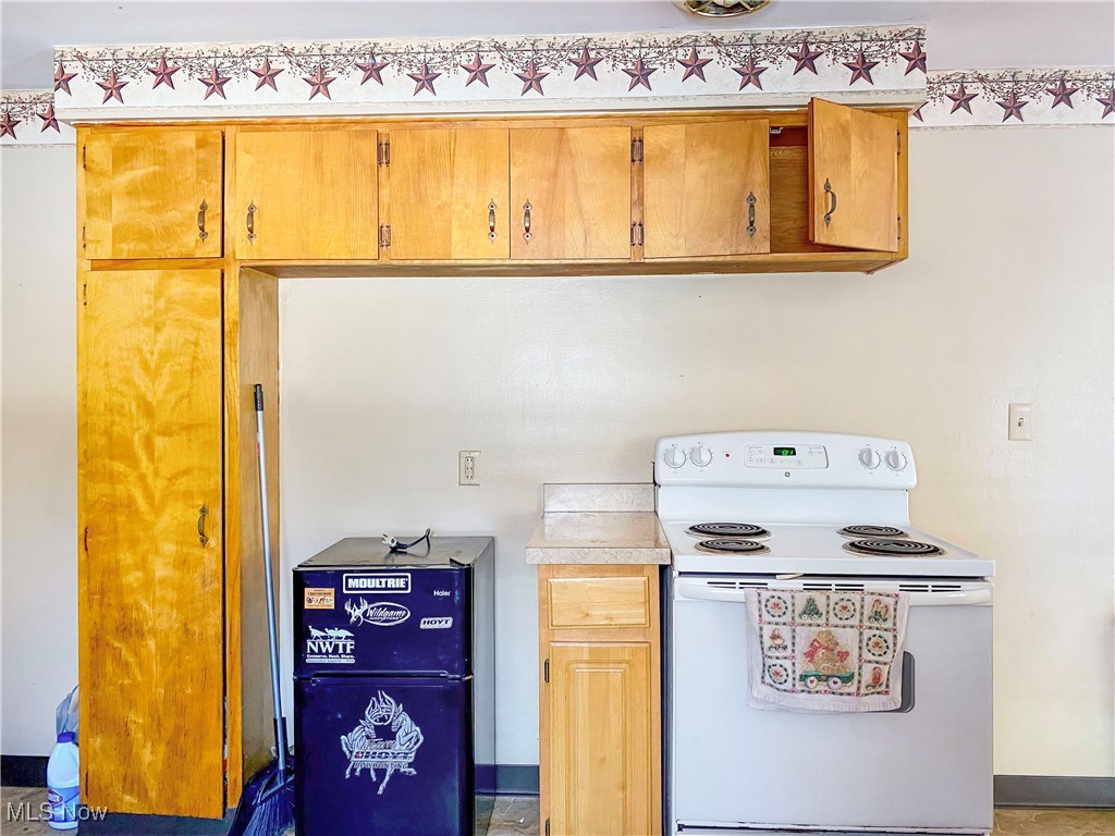 1034 Straub Road West Mansfield, OH 44904 - Photo 8 of 27 Kitchen with electric range
