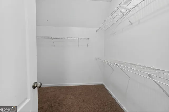 a view of a room with racks on the wall