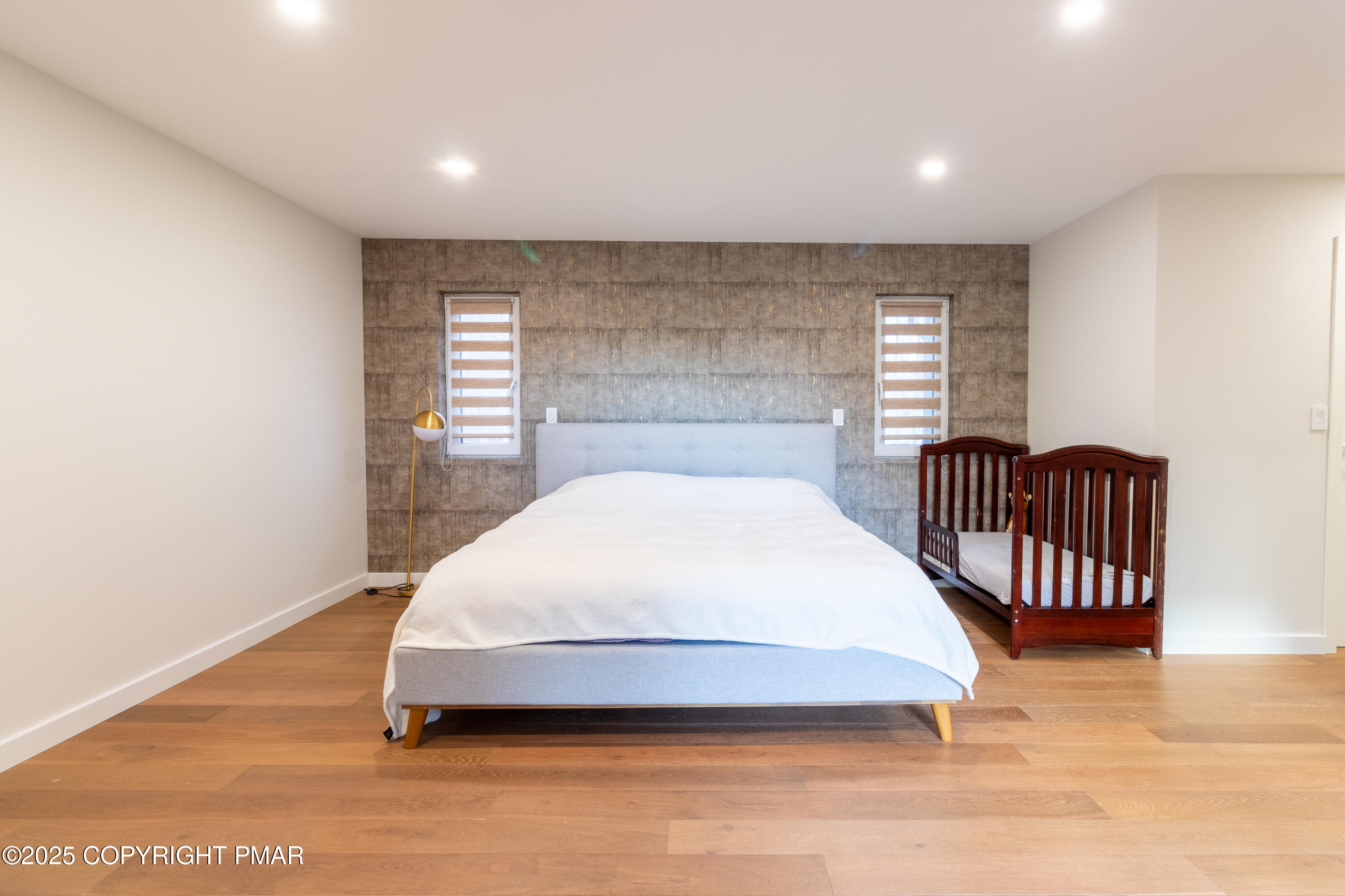 2226 Bedford Court Bushkill, PA 18371 - Photo 26 of 79 a spacious bedroom with a bed and a window