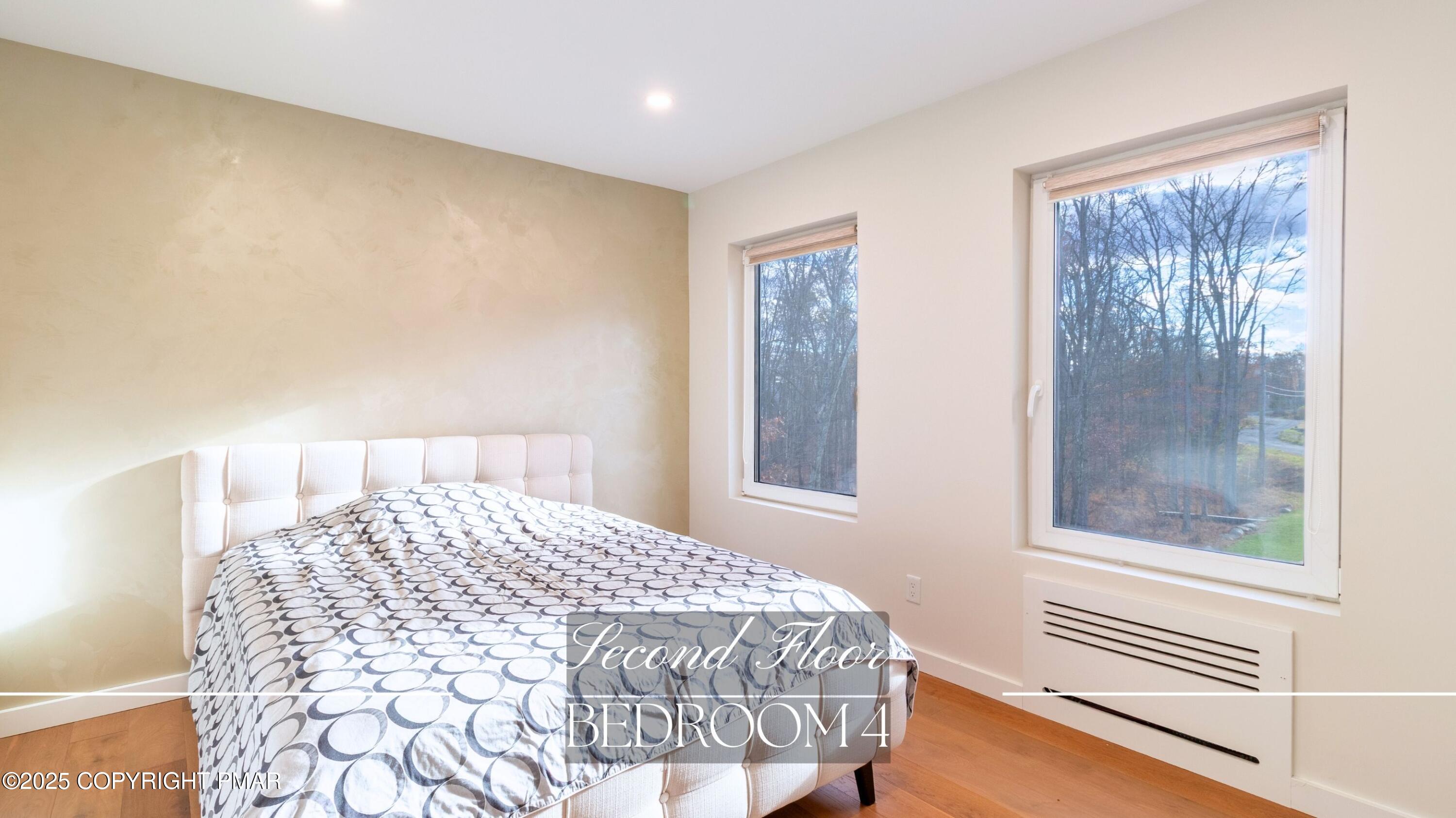 2226 Bedford Court Bushkill, PA 18371 - Photo 36 of 79 a bedroom with a bed and a window