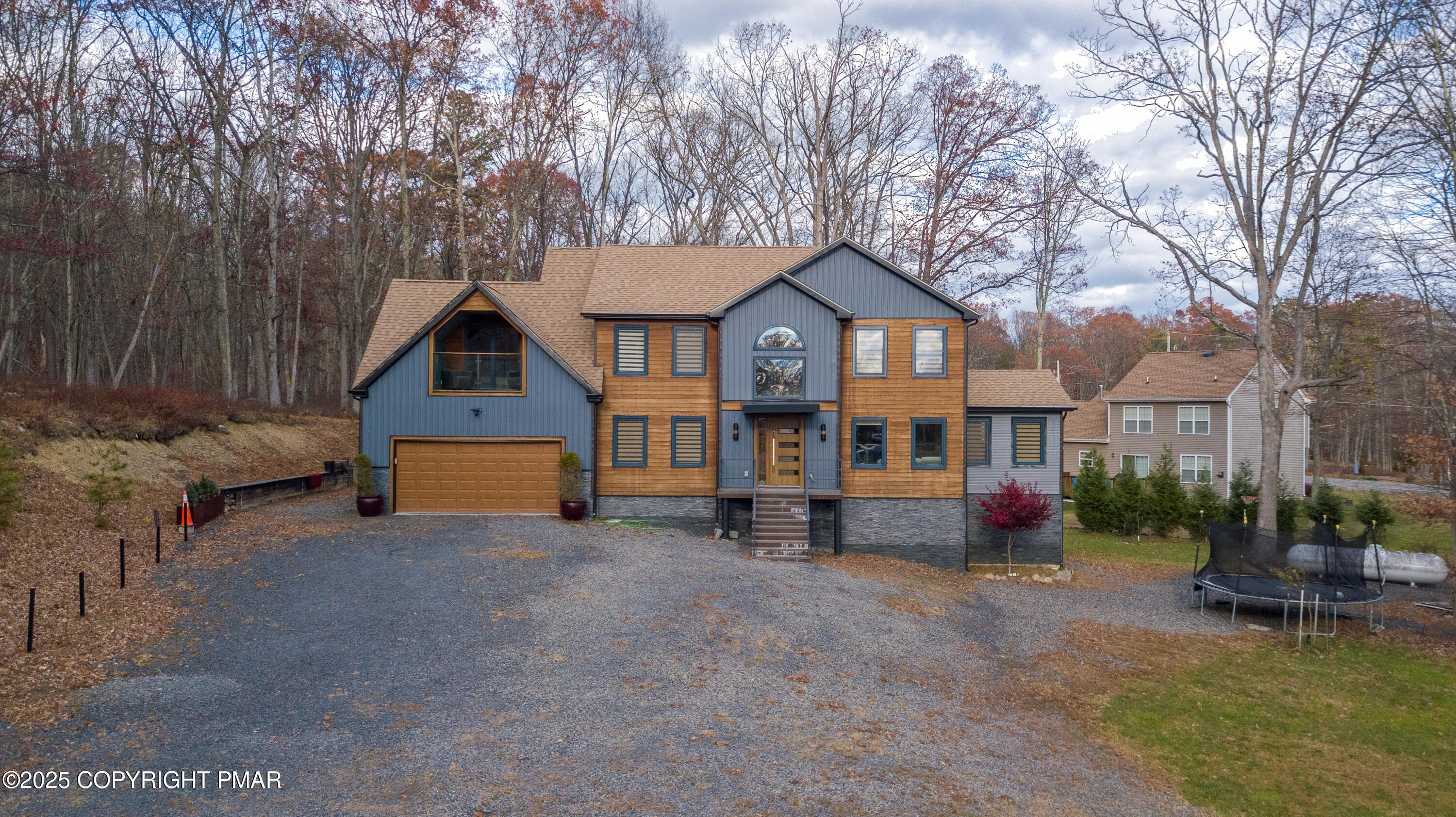 2226 Bedford Court Bushkill, PA 18371 - Photo 52 of 79 a view of a house with a yard and large tree