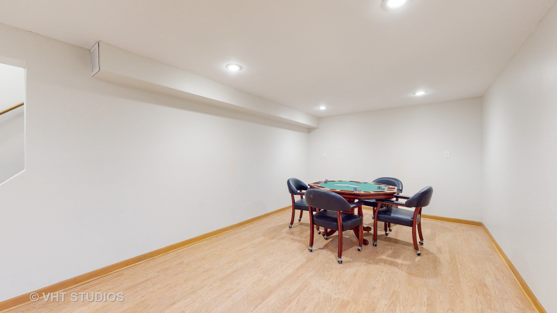 256 Stonegate Road Trout Valley, IL 60013 - Photo 25 of 52 a view of a dining room with furniture and chandelier
