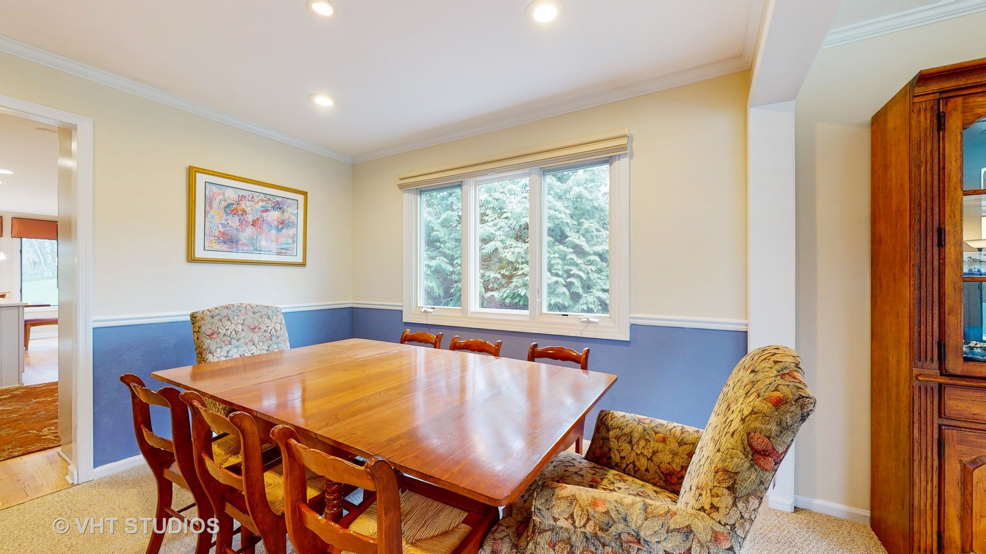 256 Stonegate Road Trout Valley, IL 60013 - Photo 8 of 52 a view of a dining room with furniture and a window