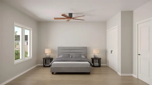 a bedroom with a bed and window