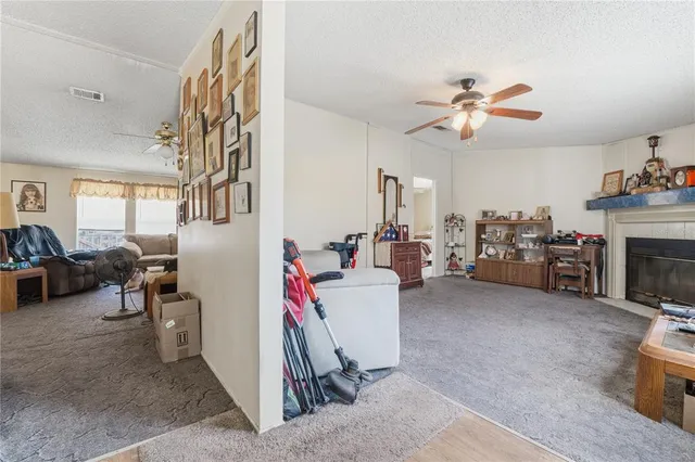 a view of a livingroom with furniture and a livingroom
