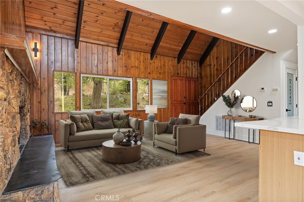 1076 Grass Valley Road Lake Arrowhead, CA 92352 - Photo 2 of 35 Level entry living area with modern rustic finishes and beautiful vaulted ceilings. (Virtually staged)