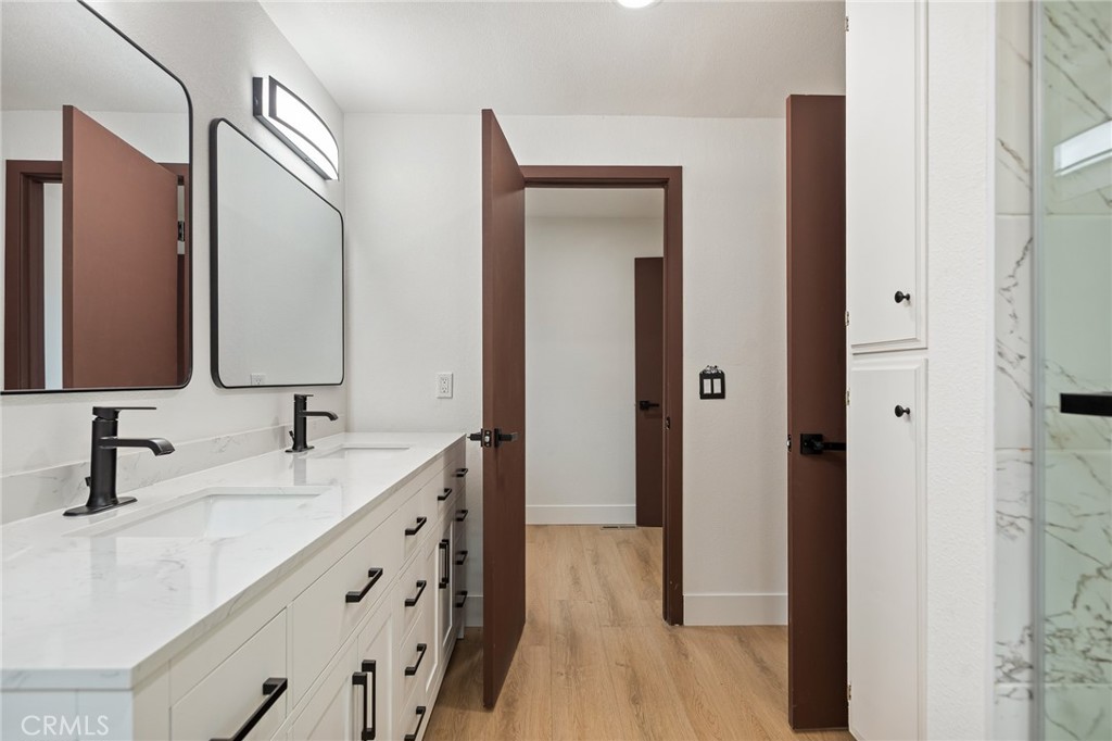 1076 Grass Valley Road Lake Arrowhead, CA 92352 - Photo 22 of 35 Dual sinks and mirrors, quartz counters