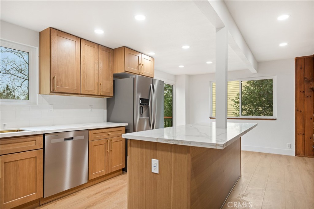 1076 Grass Valley Road Lake Arrowhead, CA 92352 - Photo 10 of 35 Quartz counters, wood cabinets