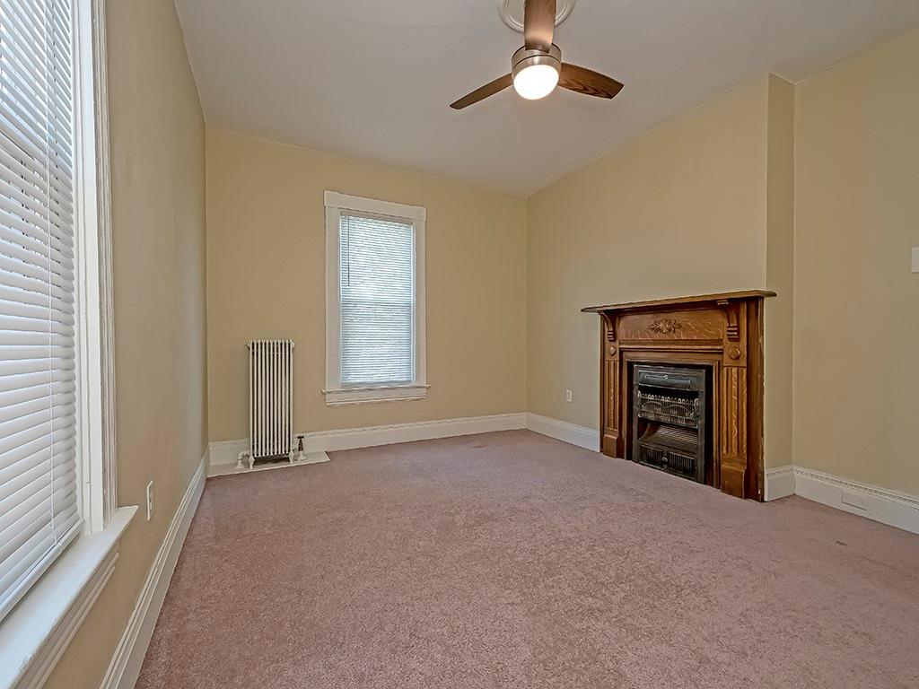 449 Library Avenue Carnegie, PA 15106 - Photo 13 of 22 an empty room with windows and fan