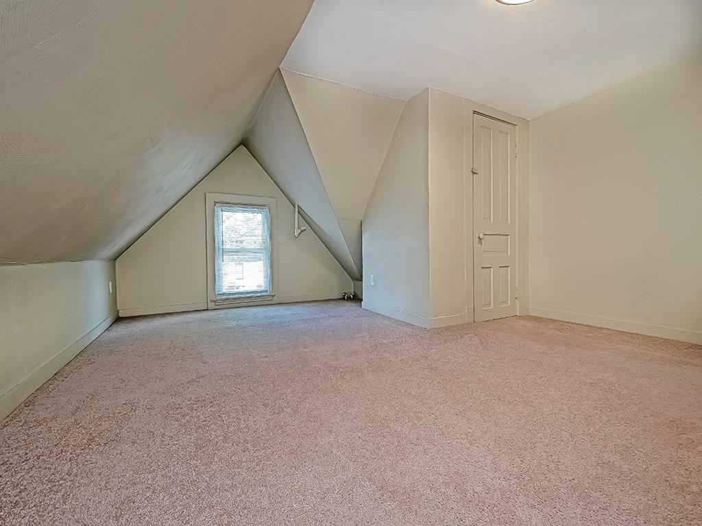 449 Library Avenue Carnegie, PA 15106 - Photo 15 of 22 a view of a livingroom with an empty space and a window