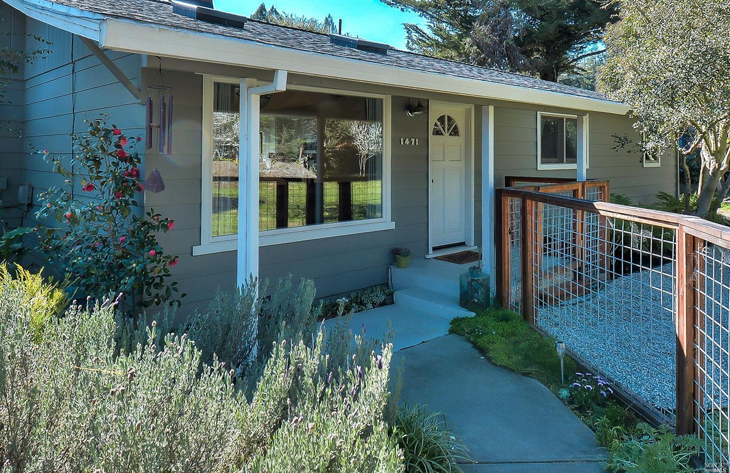 1471 Bloomfield Road Sebastopol, CA 95472 - Photo 1 of 1 a front view of a house with garden