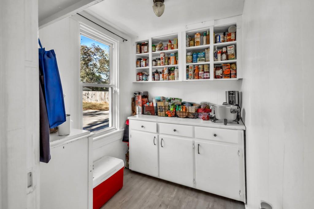 911 Highway 85 Connector Brooks, GA 30205 - Photo 19 of 45 a kitchen with stainless steel appliances cabinets and a window