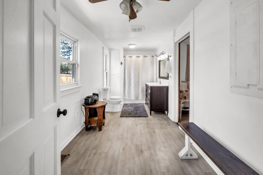 911 Highway 85 Connector Brooks, GA 30205 - Photo 21 of 45 a living room with furniture and a chandelier