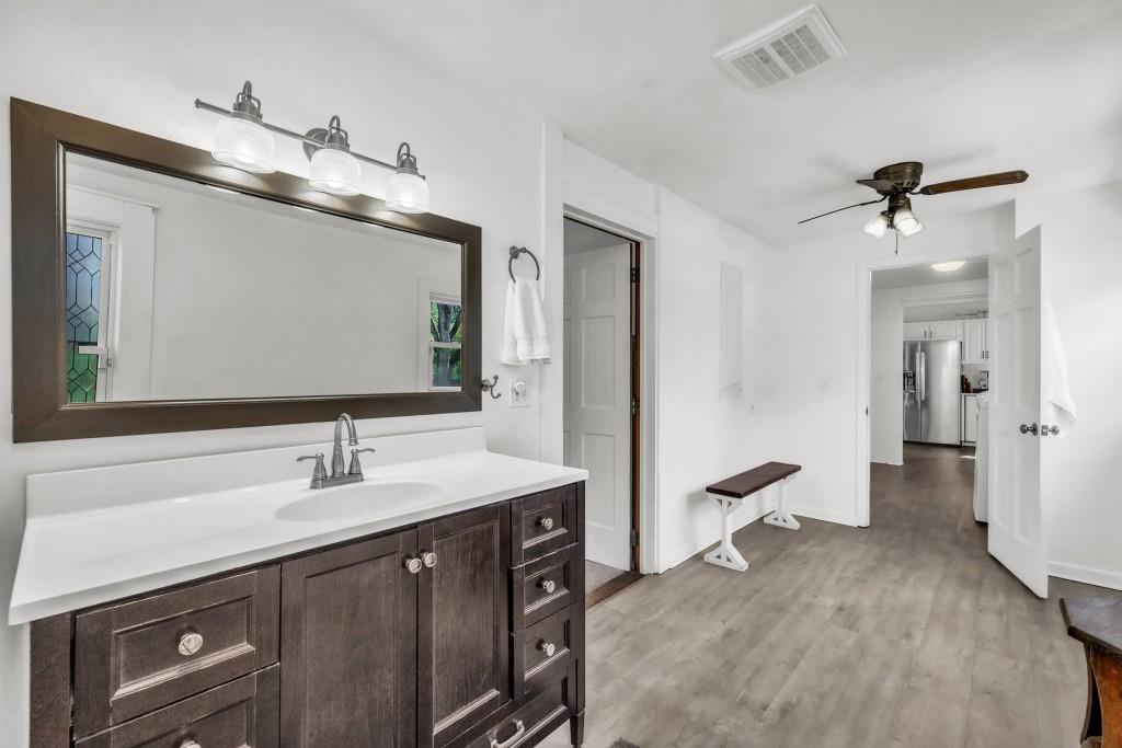 911 Highway 85 Connector Brooks, GA 30205 - Photo 26 of 45 a en suite bathroom with a sink and a mirror