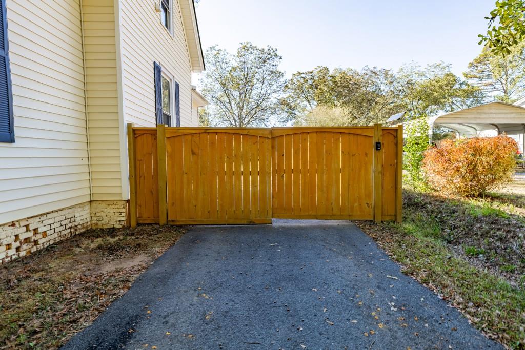 911 Highway 85 Connector Brooks, GA 30205 - Photo 35 of 45 a view of a backyard with pathway