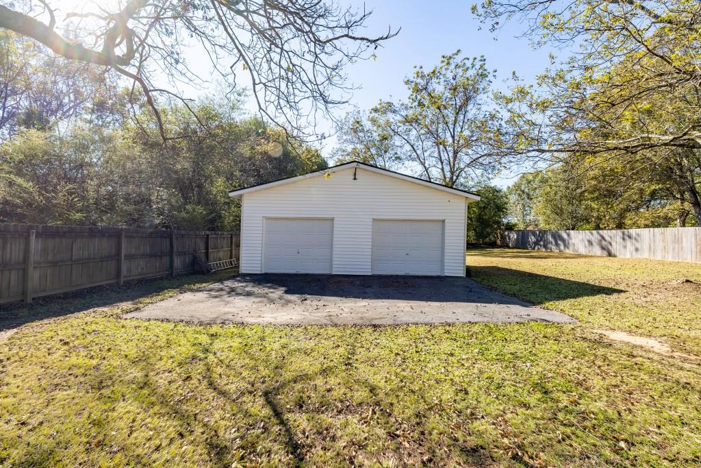911 Highway 85 Connector Brooks, GA 30205 - Photo 40 of 45 a view of backyard with tree