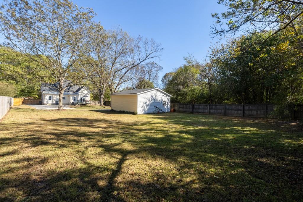 911 Highway 85 Connector Brooks, GA 30205 - Photo 41 of 45 a house view with swimming pool in front of it
