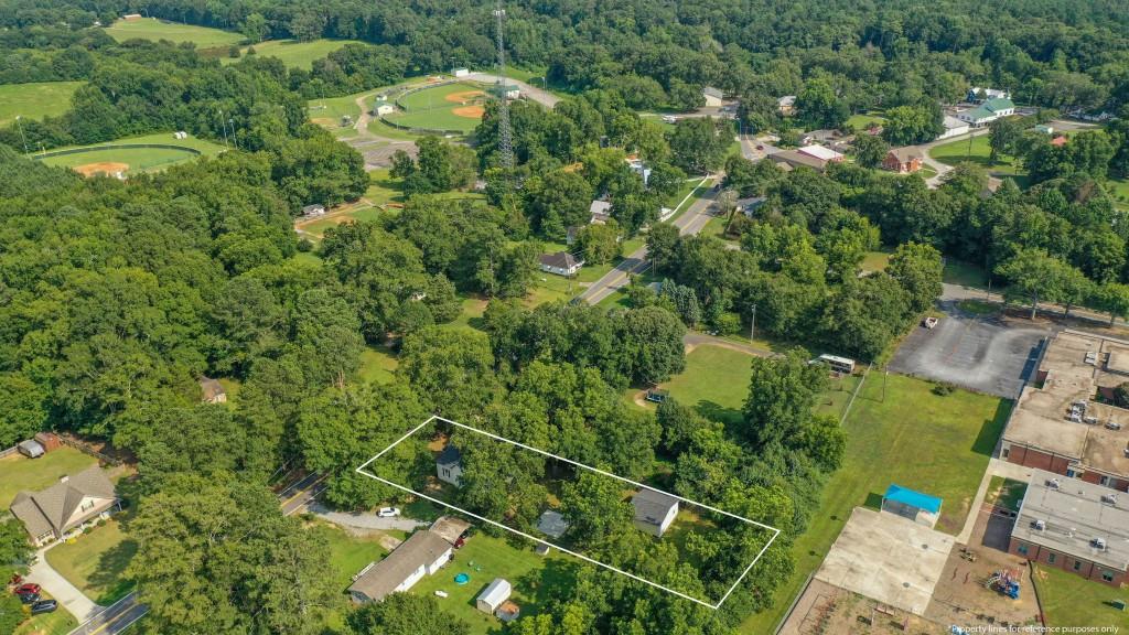 911 Highway 85 Connector Brooks, GA 30205 - Photo 44 of 45 an aerial view of a house with a yard