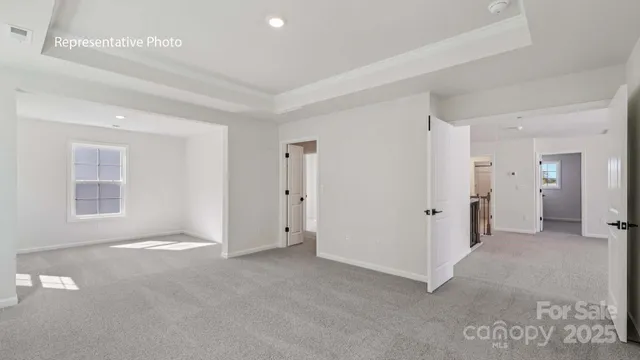 a view of empty room with windows