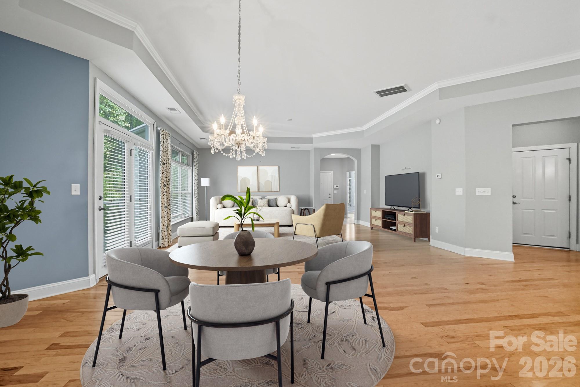 2232 Coltsview Lane Matthews, NC 28105 - Photo 12 of 47 a view of a dining room with furniture and wooden floor