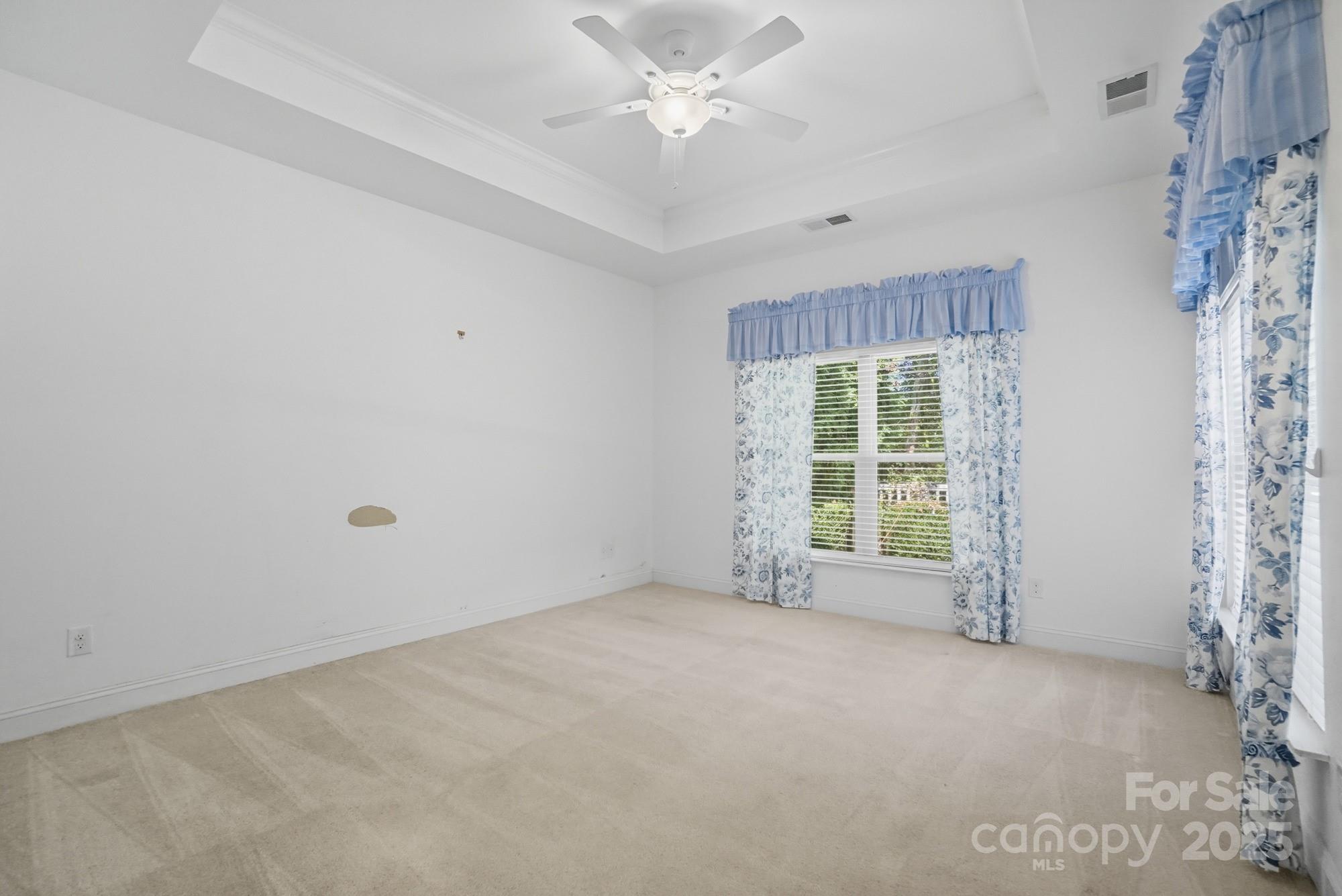 2232 Coltsview Lane Matthews, NC 28105 - Photo 19 of 42 a view of an empty room with a window