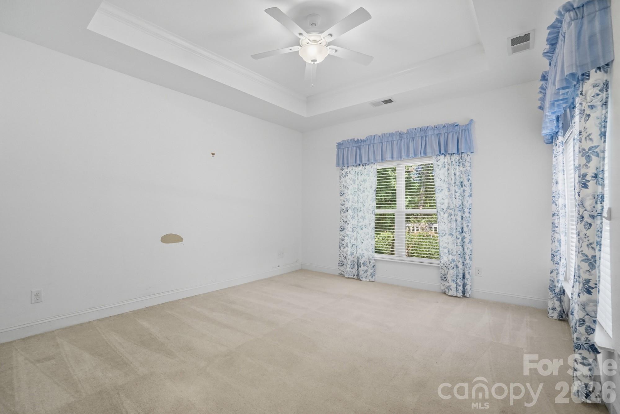 2232 Coltsview Lane Matthews, NC 28105 - Photo 22 of 47 a view of an empty room with a window