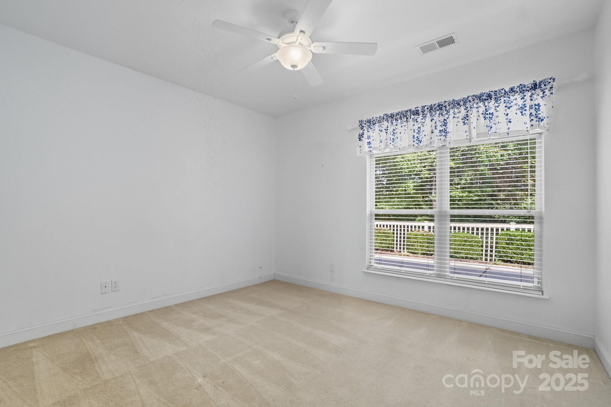2232 Coltsview Lane Matthews, NC 28105 - Photo 27 of 42 a view of an empty room with a window