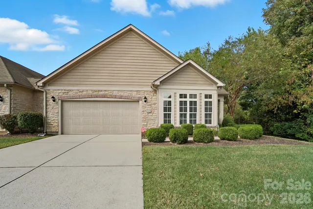 front view of a house and a yard