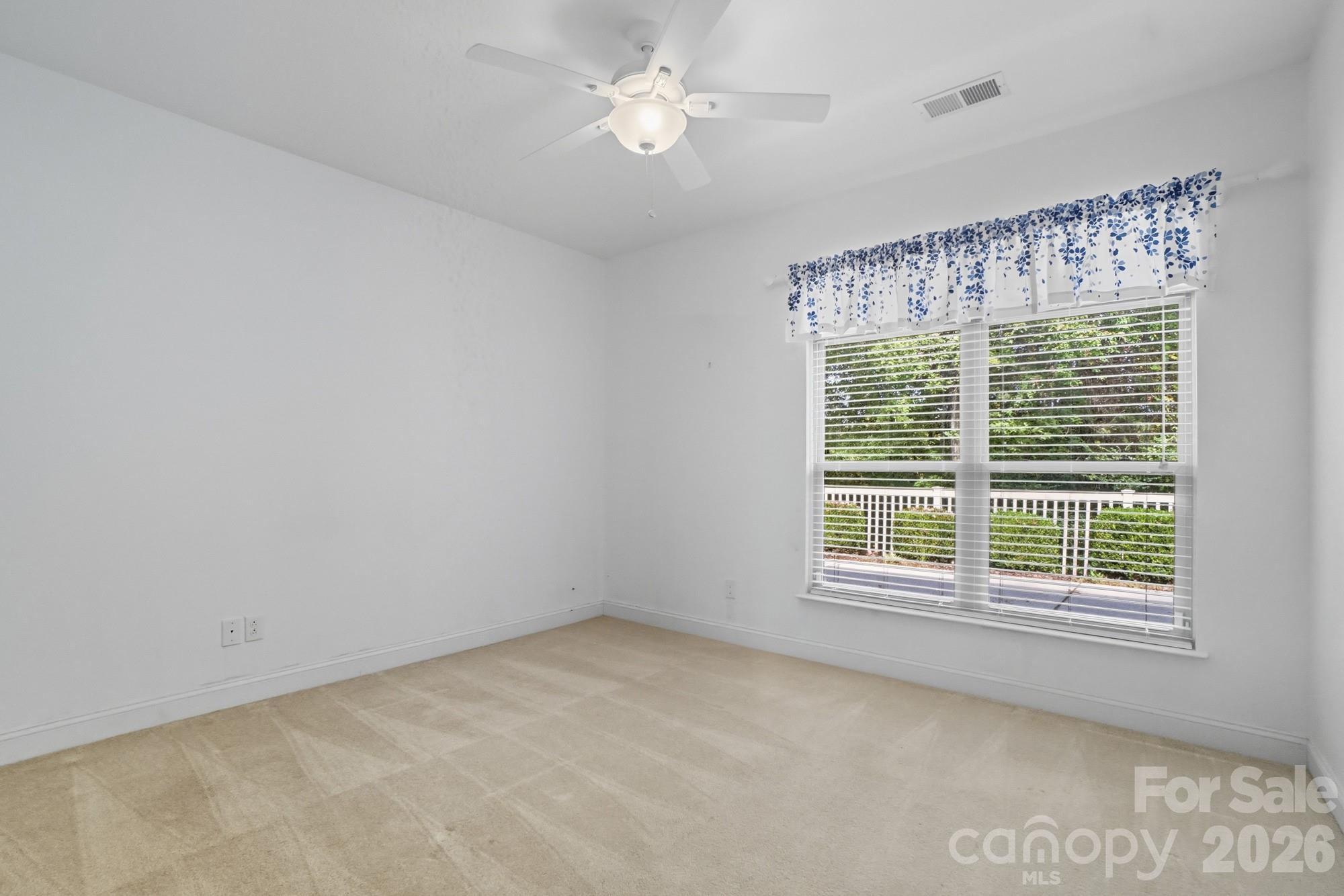 2232 Coltsview Lane Matthews, NC 28105 - Photo 31 of 47 a view of an empty room with a window