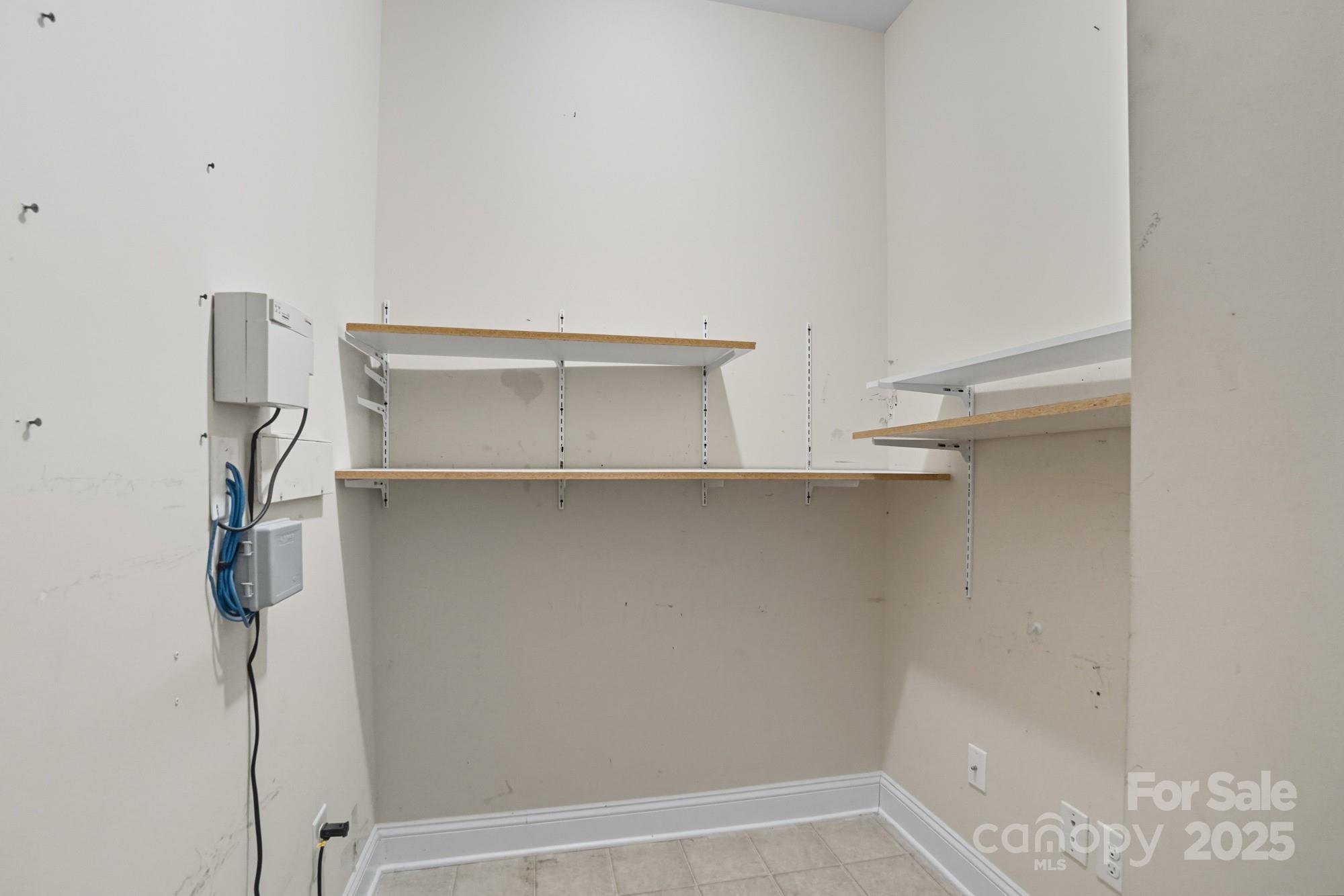 2232 Coltsview Lane Matthews, NC 28105 - Photo 31 of 42 a view of small space with racks on the wall