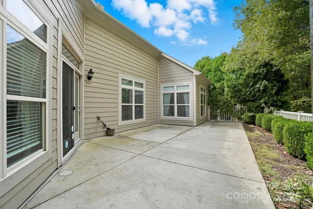 a front view of a house with a garage