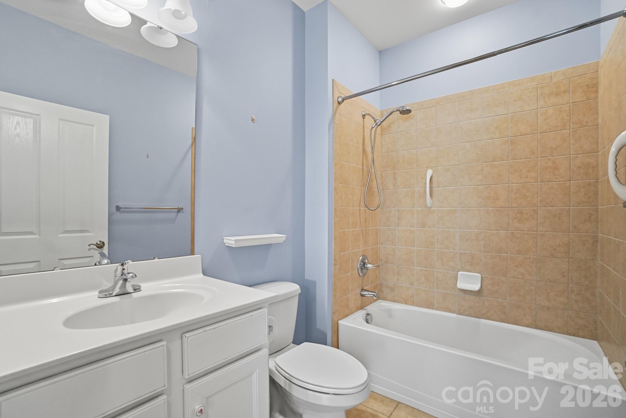 2232 Coltsview Lane Matthews, NC 28105 - Photo 34 of 47 a bathroom with a sink toilet vanity and shower
