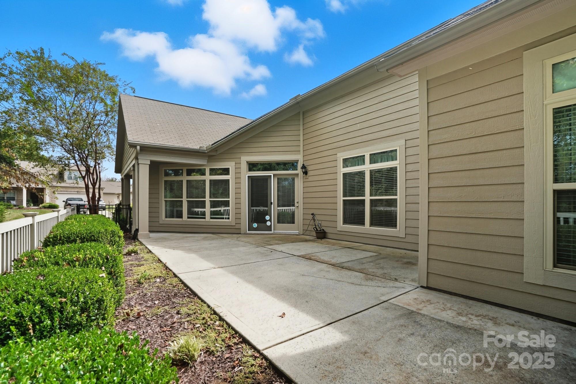 2232 Coltsview Lane Matthews, NC 28105 - Photo 34 of 42 a front view of a house with a garage