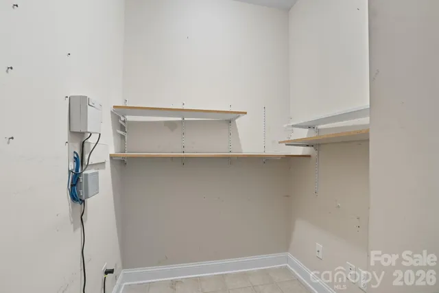 a view of small space with racks on the wall