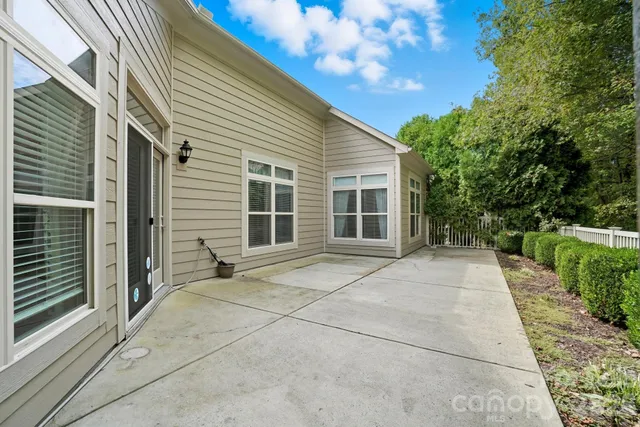 a house view with a backyard space