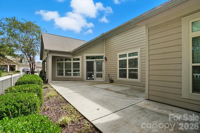 a front view of a house with a garage