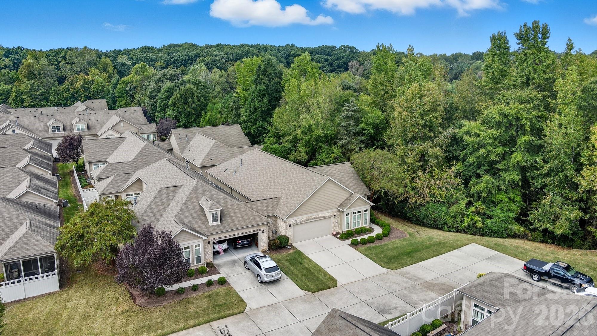 2232 Coltsview Lane Matthews, NC 28105 - Photo 40 of 47 an aerial view of a house with yard
