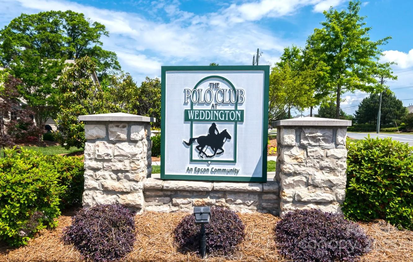2232 Coltsview Lane Matthews, NC 28105 - Photo 40 of 42 a front view of a house with garden