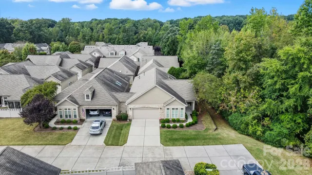 an aerial view of a house with garden
