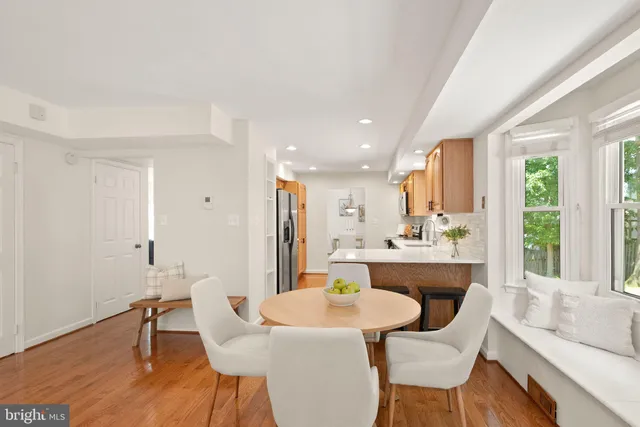 a bathroom with a sink vanity and a mirror