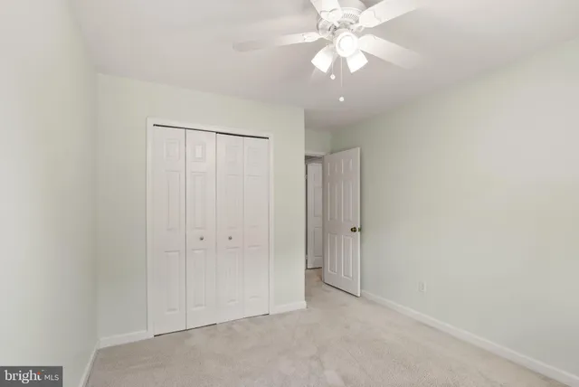 a bathroom with a sink toilet and a mirror