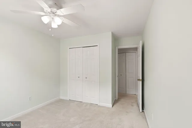 a bathroom with a shower and a toilet