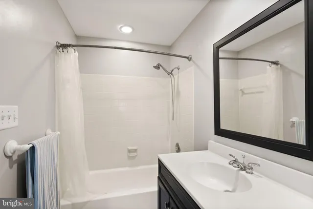 an aerial view of a house with a yard and plants