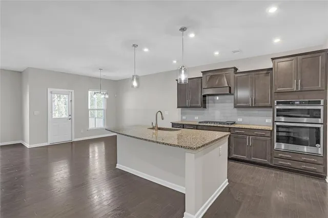 $660,000 | 3085 Alcazar Drive Southwest, Lilburn, GA 30047