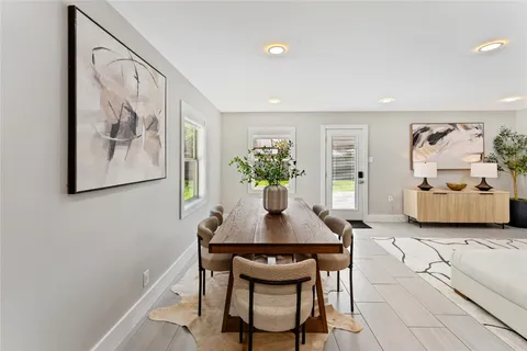 a bed room with a bed and a lamp