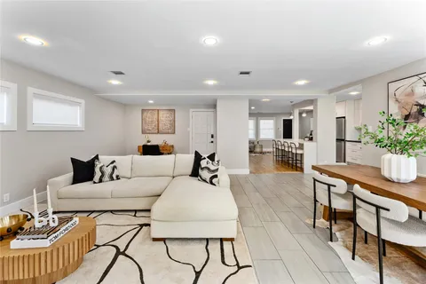 a bedroom with a bed and a ceiling fan